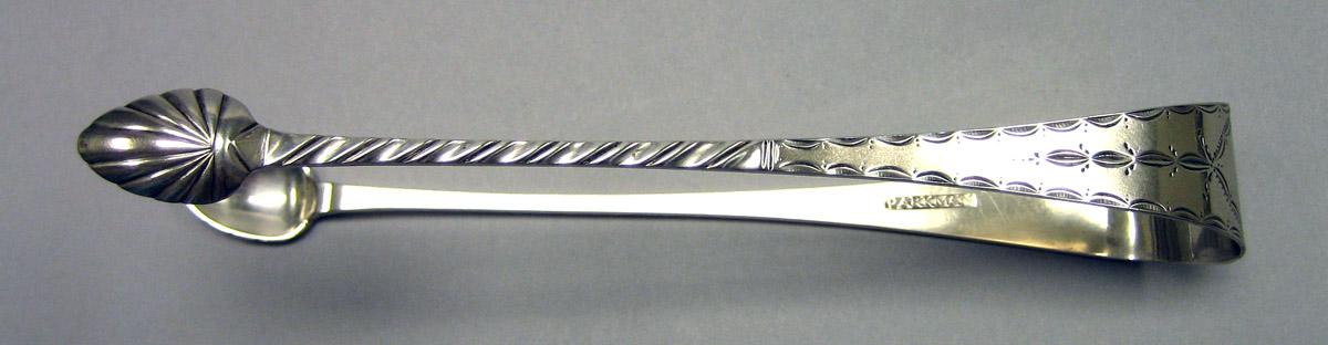 1980.0190 Silver Tongs side view