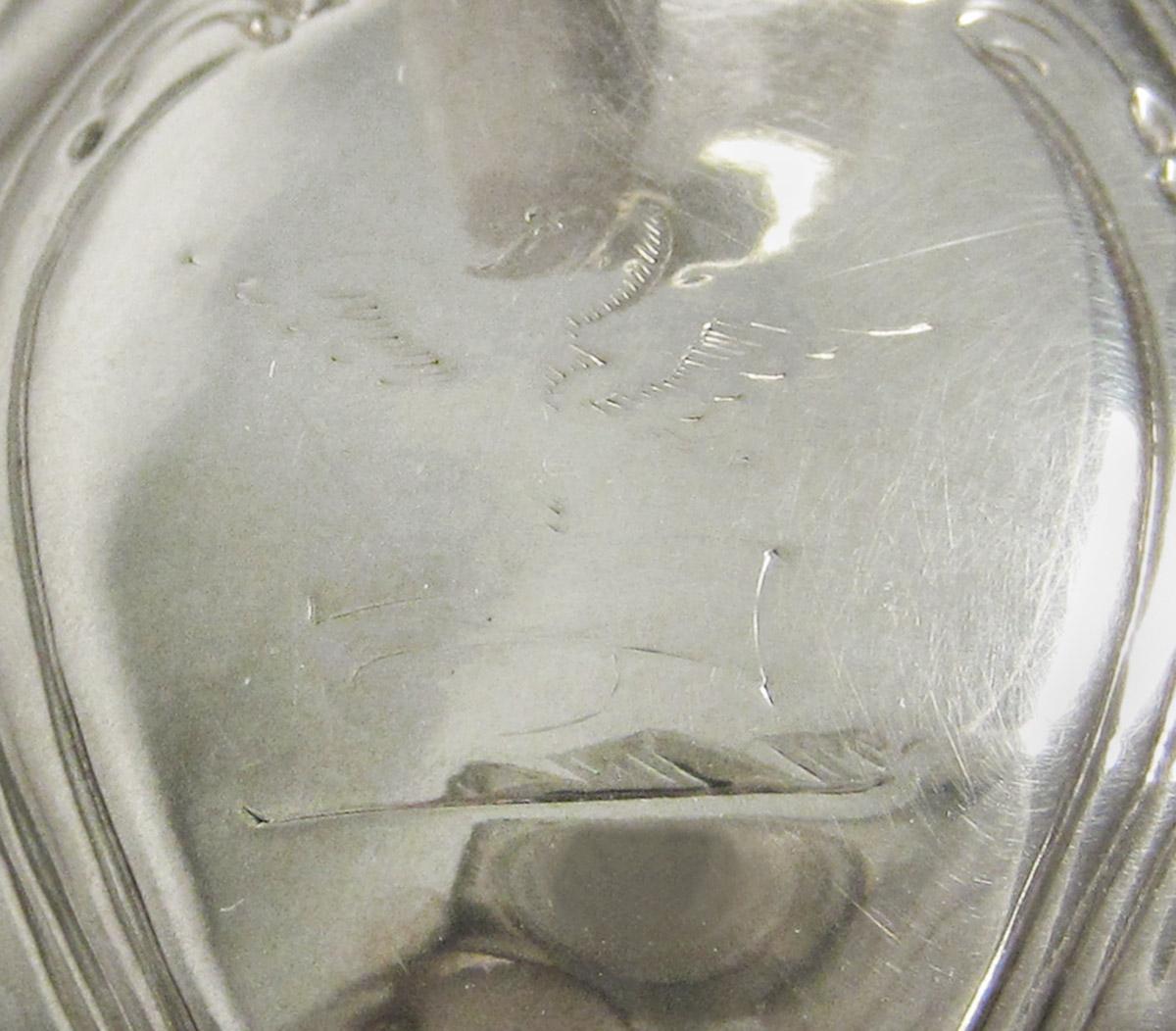 1980.0195 Cream pot, engraving