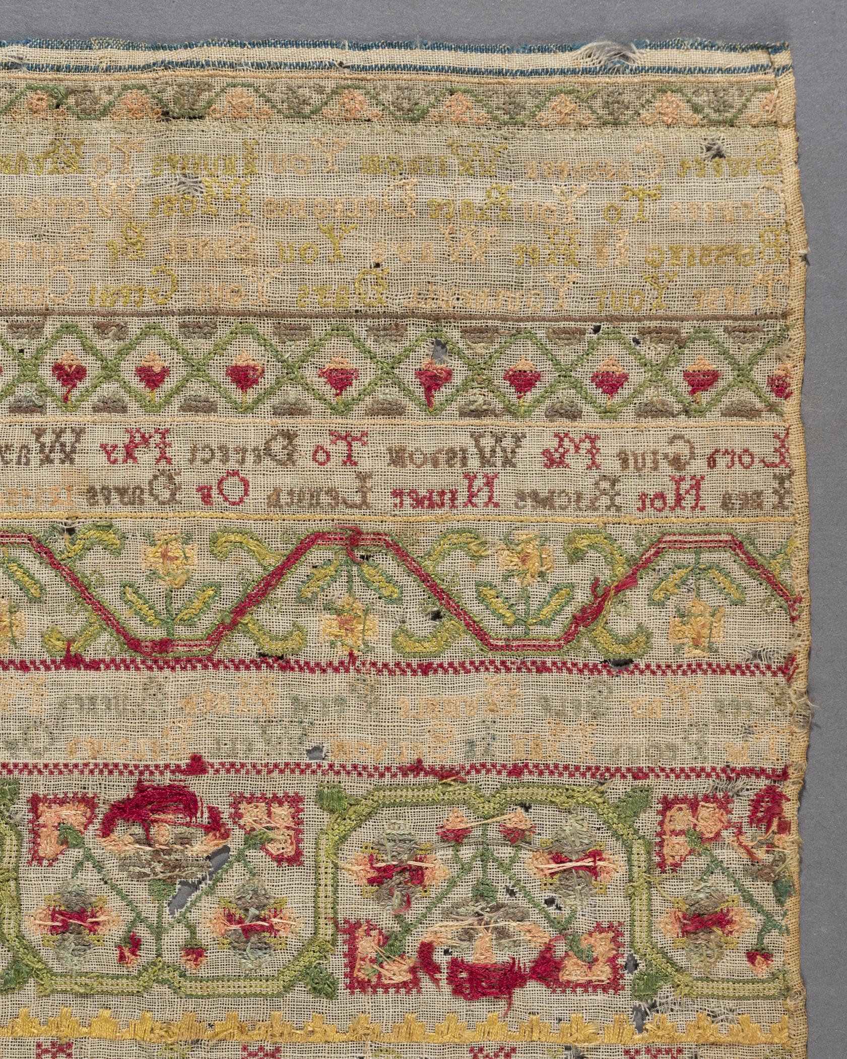 1981.0037 Sampler, reverse, detail 1, after conservation treatment