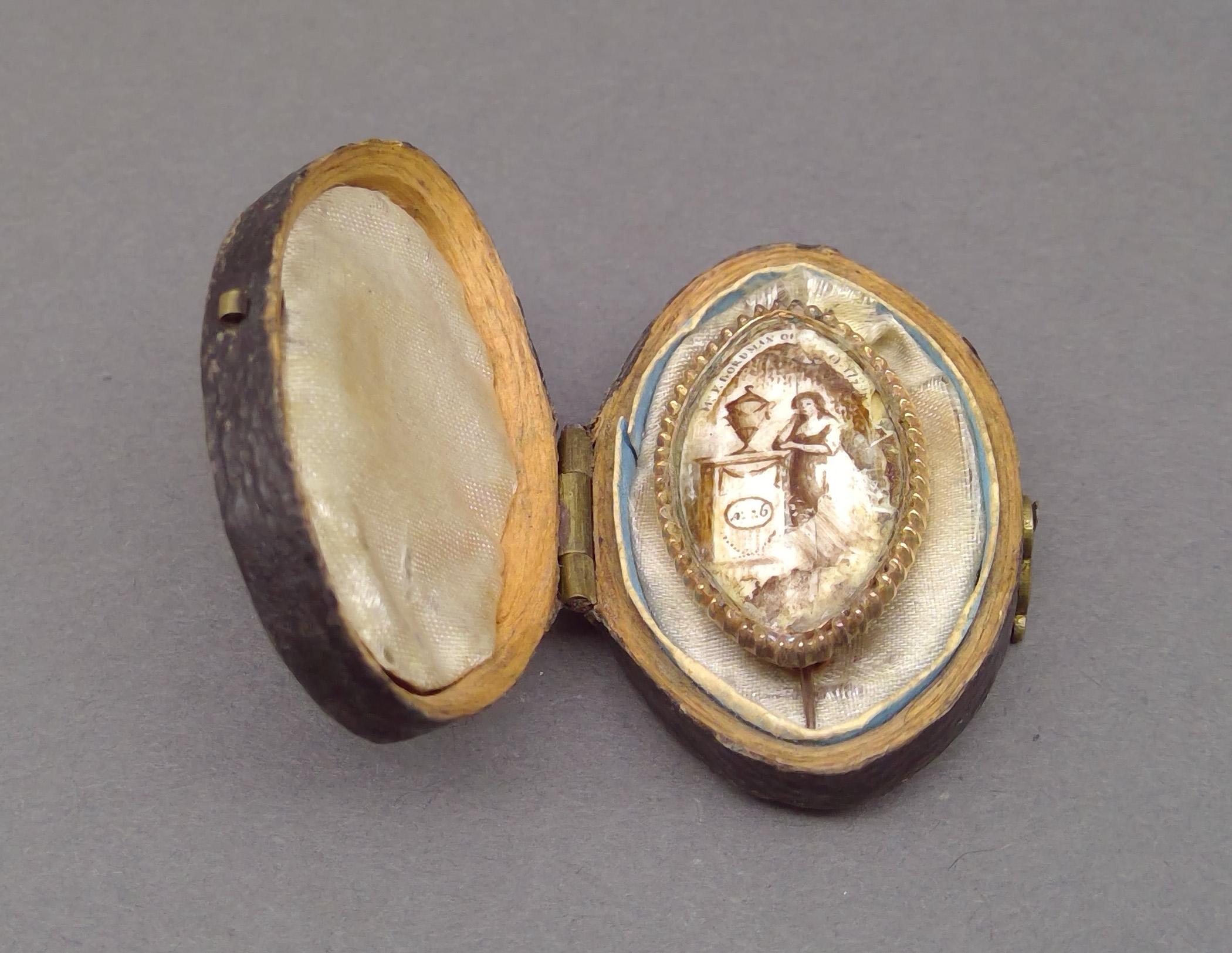 1981.0128 A, B Mourning brooch and case