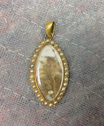 1981.0138 Locket, view 1