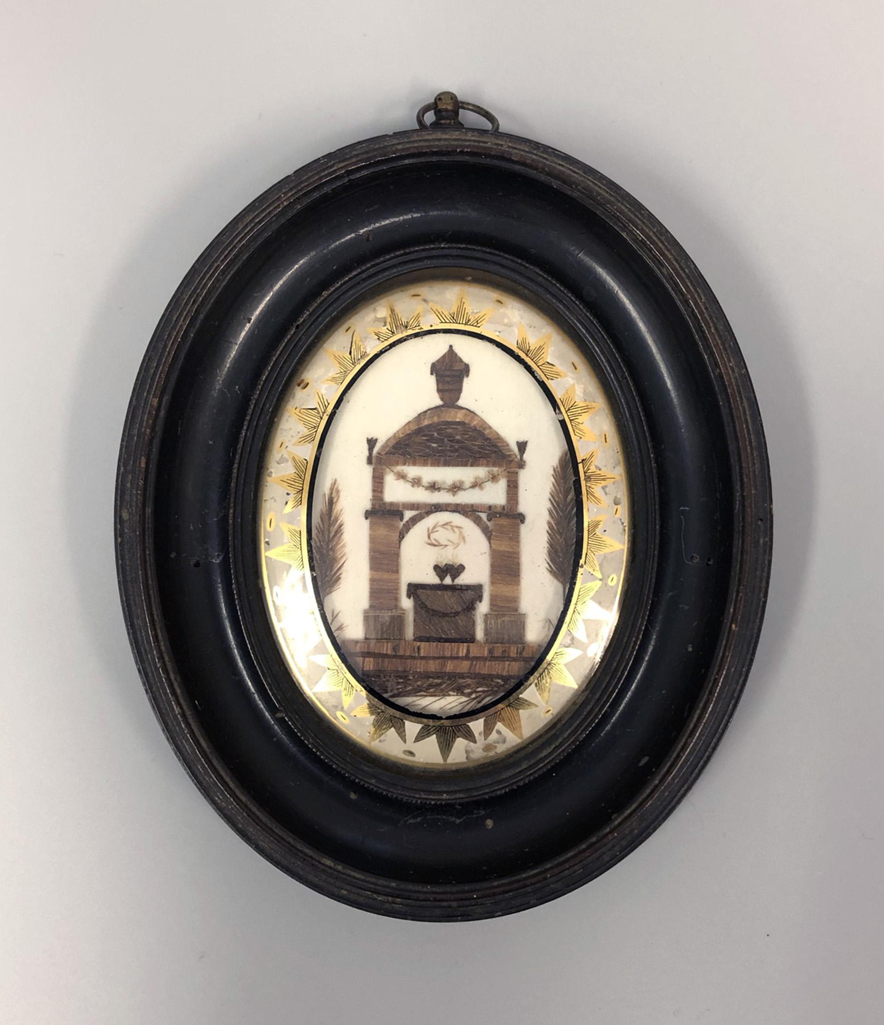 1981.0144 A, B Hairwork picture and frame