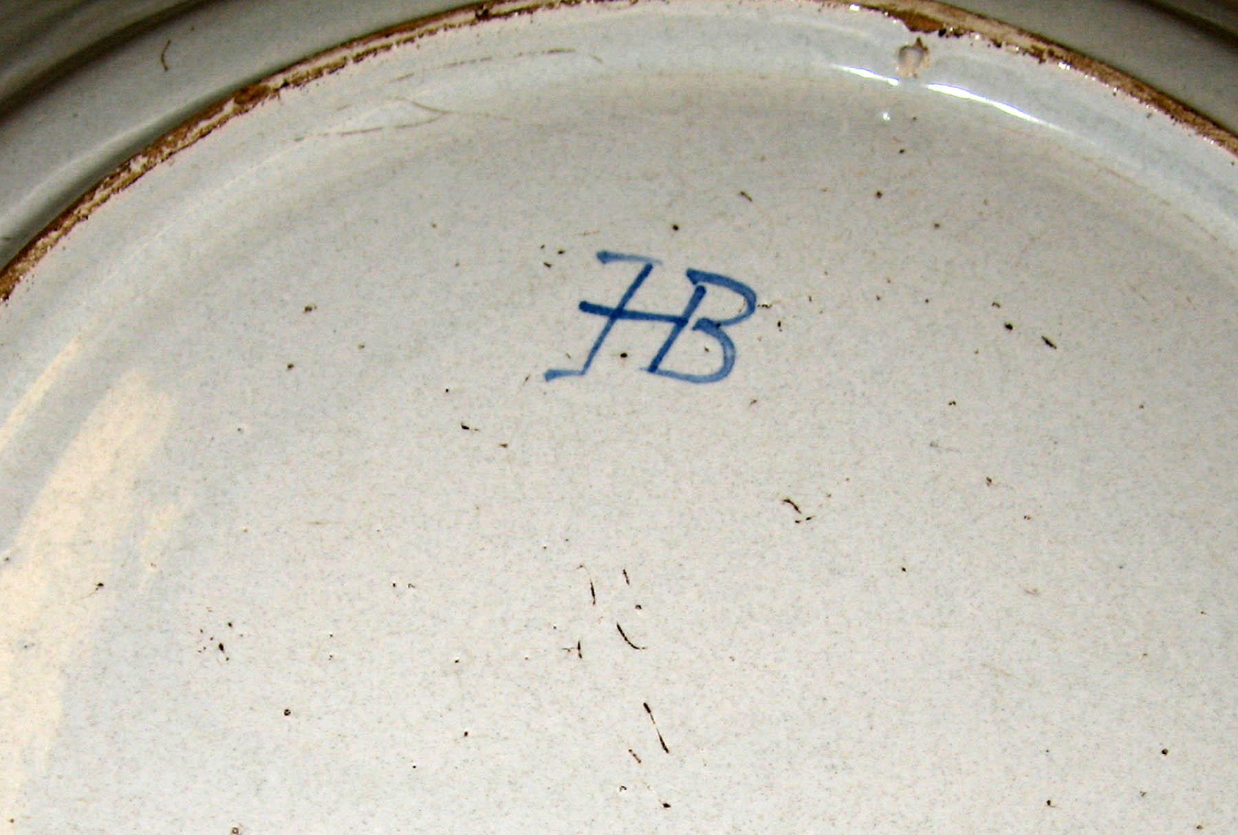 1981.0230.001 Tin-glazed earthenware dish (mark)