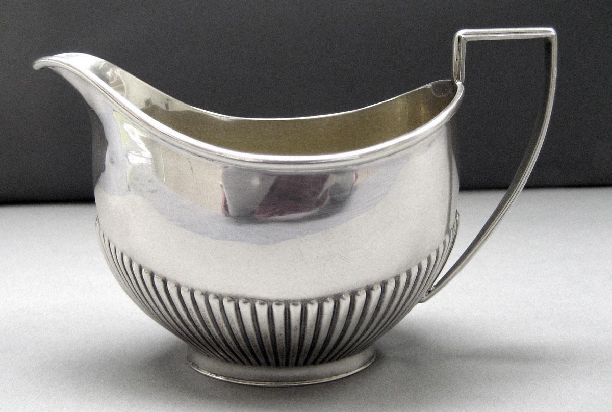 1982.0272.003 Silver Cream Pot side 1