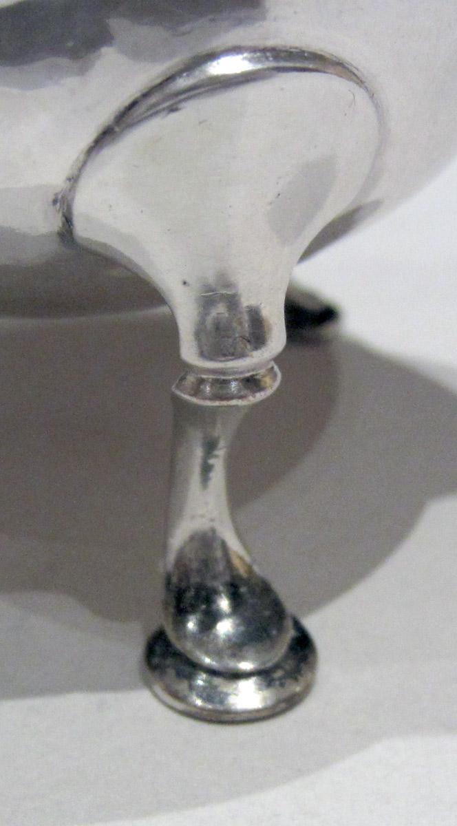 1957.1369 Silver Cream Pot leg detail