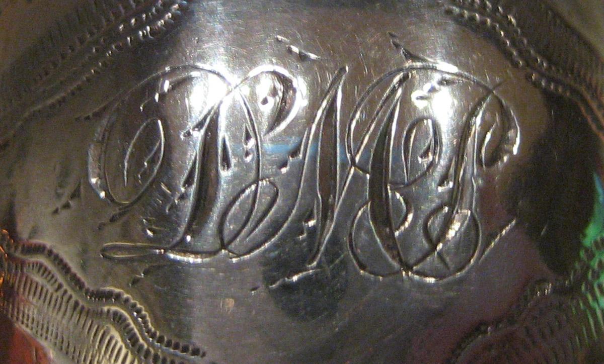 1957.1371 Sugar tongs (inscription)