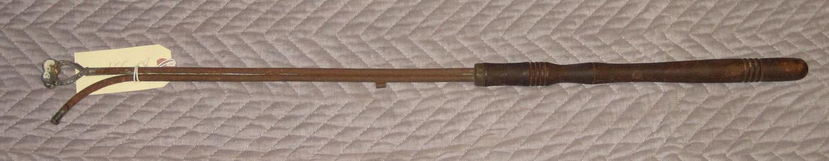 1982.0339 Gas lamp lighter