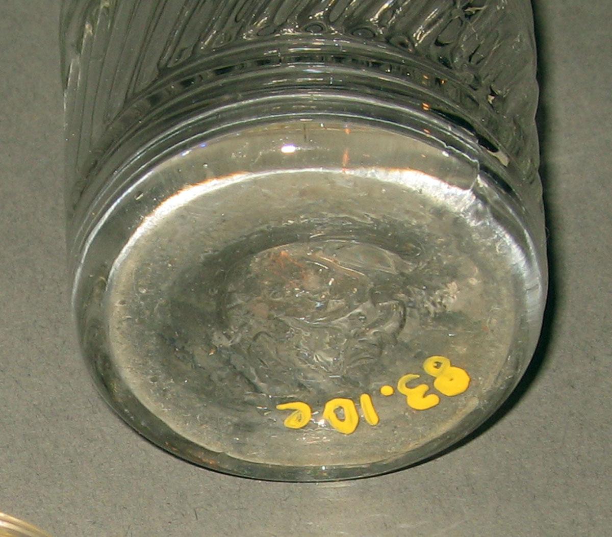 1983.0010 E Glass cruet bottle (underside)