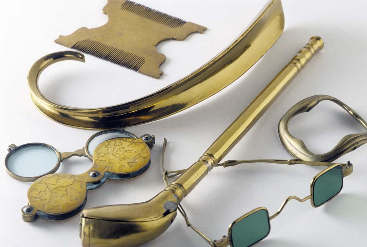 1961.1170, 1959.0154, 1983.0060, 1952.0008, 1958.2373, 1959.0029 Spectacles, Spectacles and Case, Case, Buckle, Pipe Case, Shoe Horn, Comb