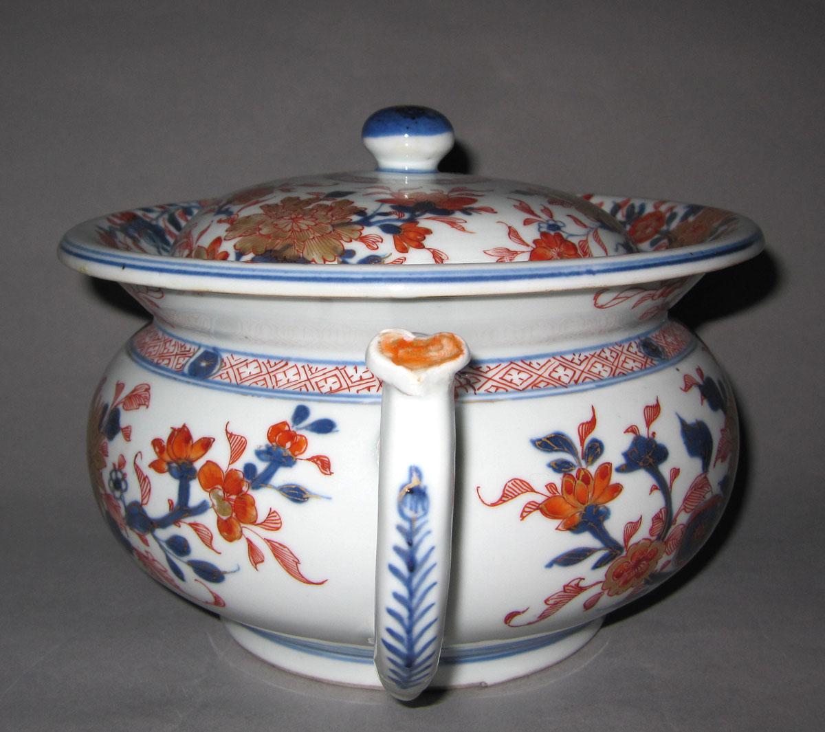 1983.0063 A,B Porcelain chamber pot handle
