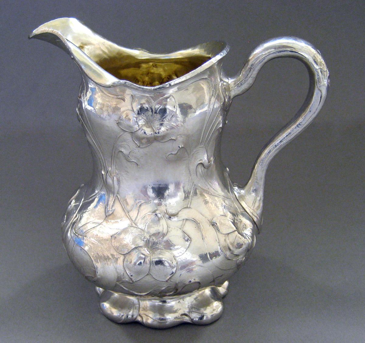 1983.0108.003 Silver Cream Pot side 1