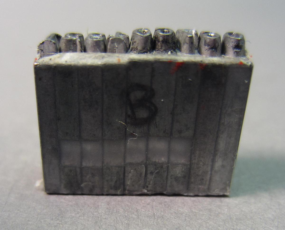 1983.0117 E Marking stamp, Mark