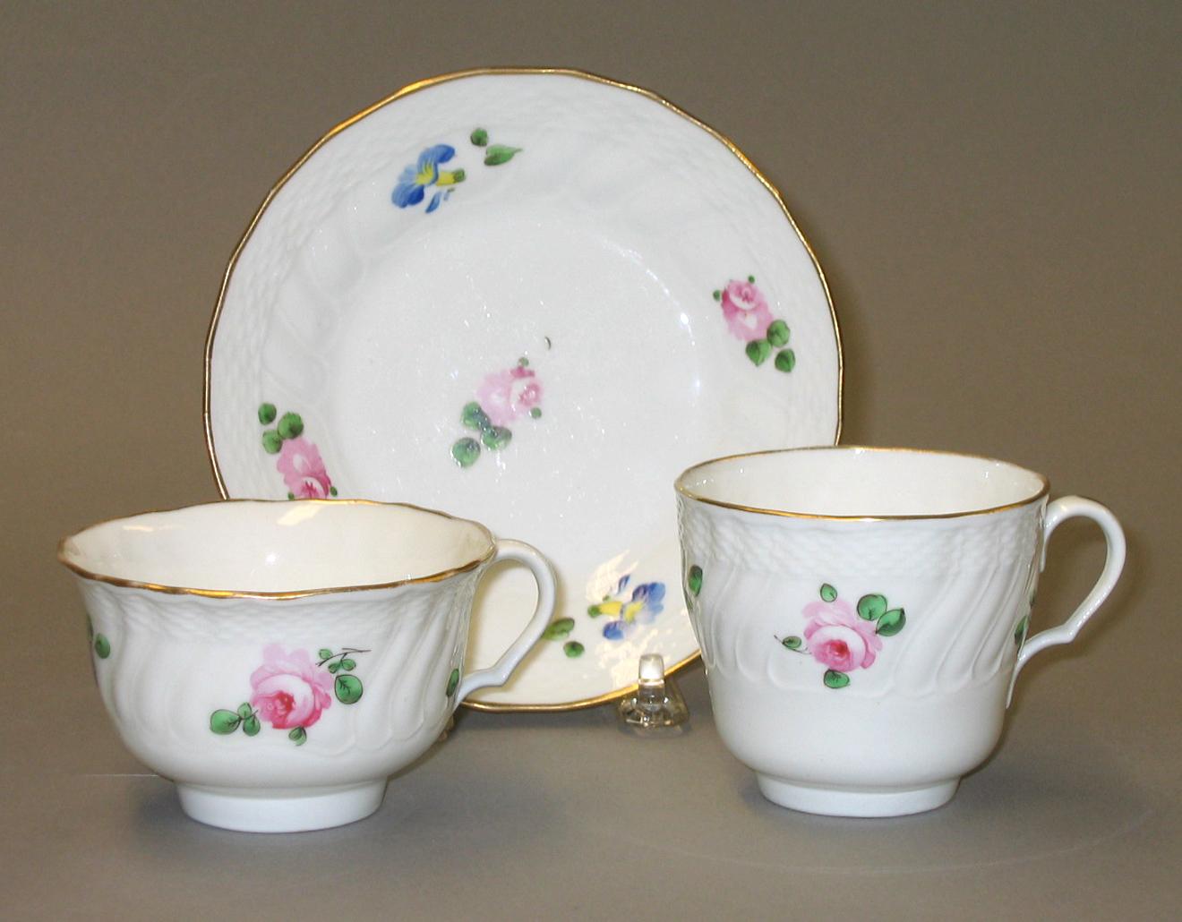 1983.0209 A-C Porcelain cup, teacup & saucer
