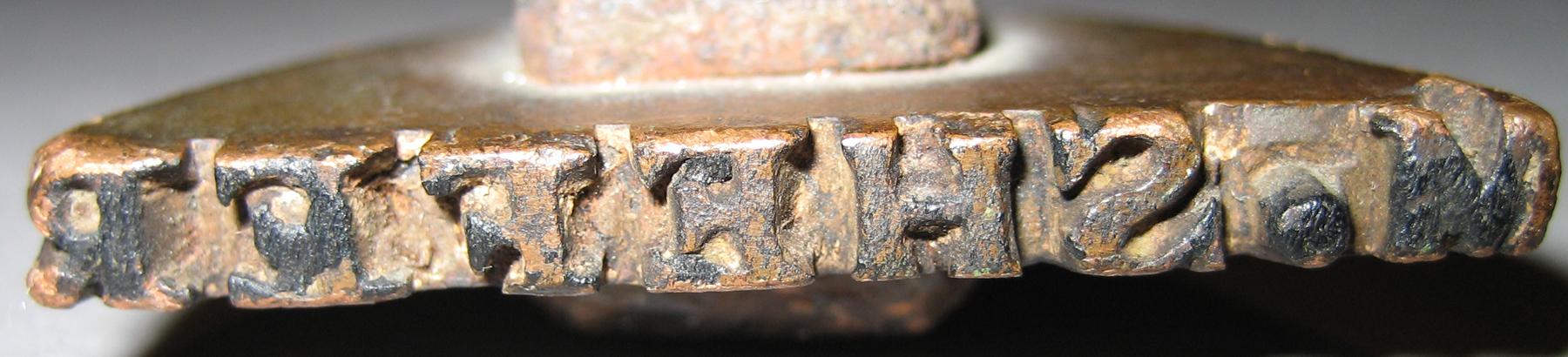 1983.0242 Name stamp (detail)