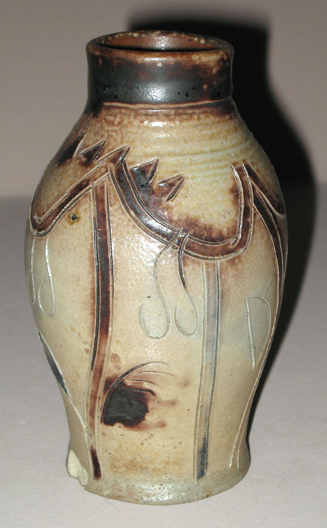 1958.0005 Salt-glazed stoneware bottle or jar (side 2)