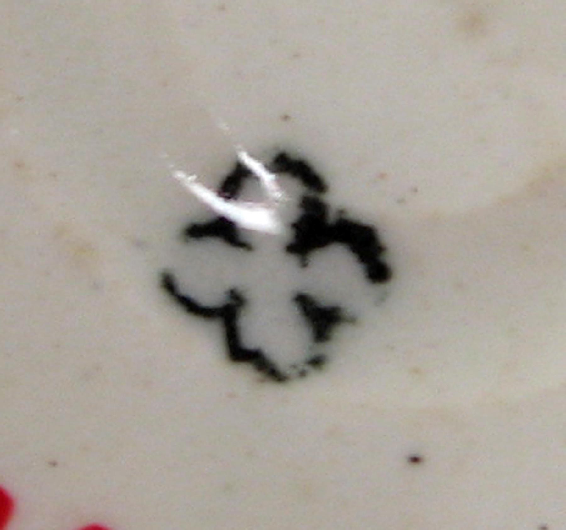 1984.0141.024 A Transfer printed luster teacup (mark)