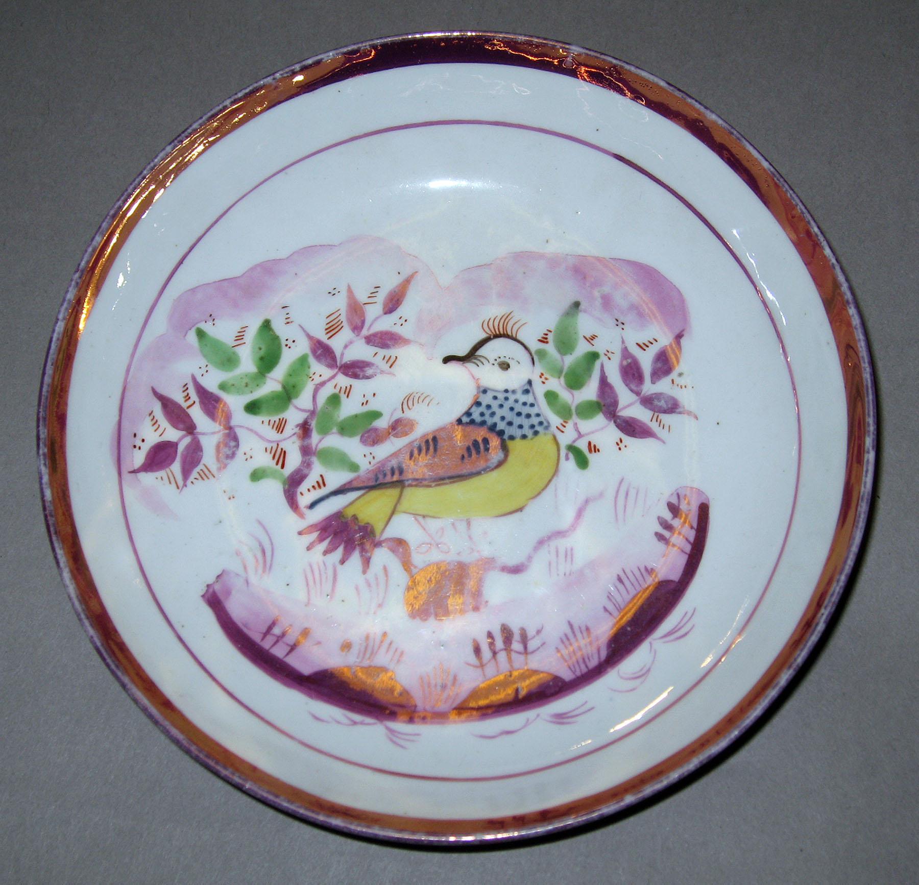 1984.0141.240.003 B  Lusterware Saucer