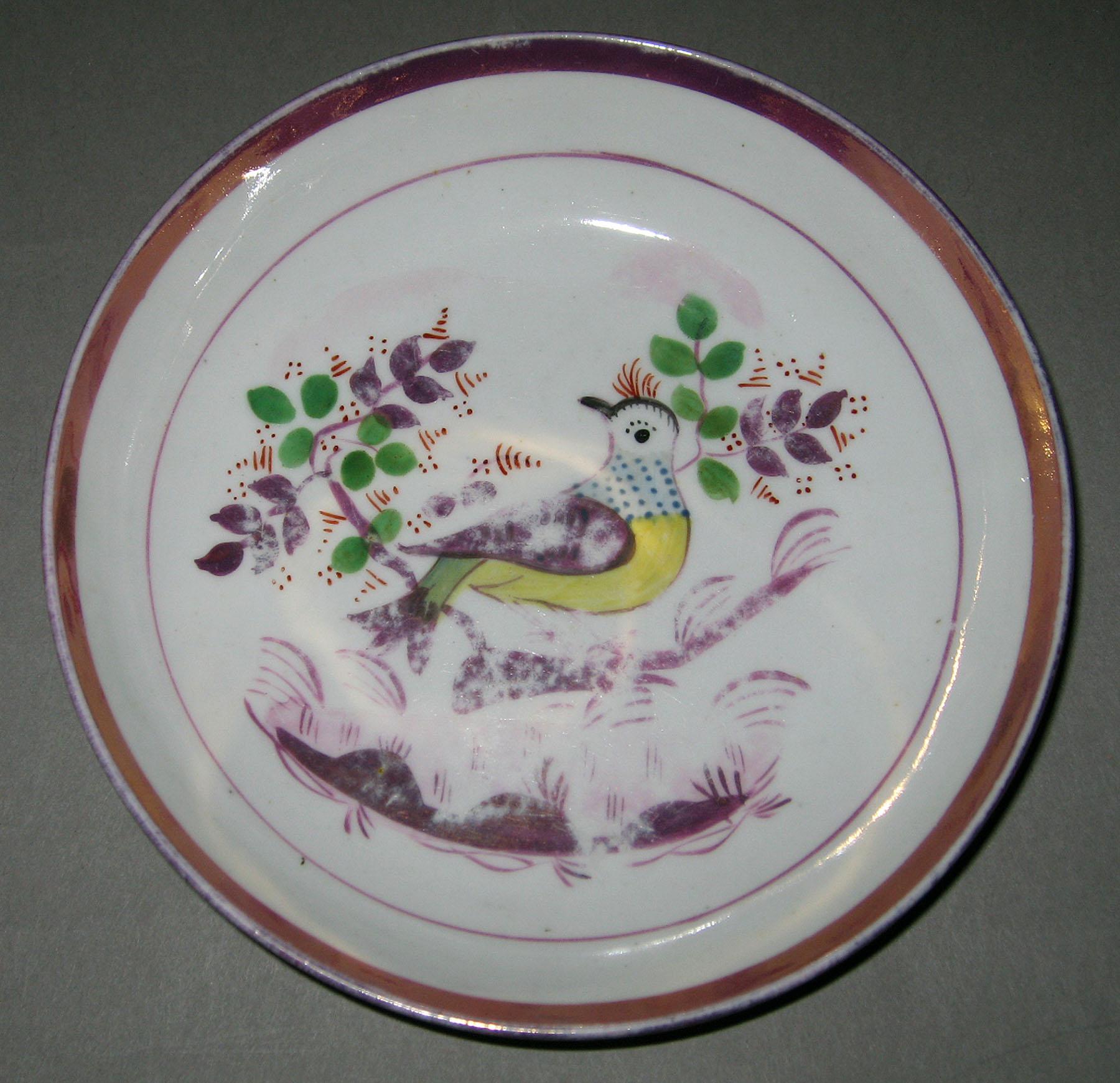 1984.0141.240.004 B Lusterware Saucer