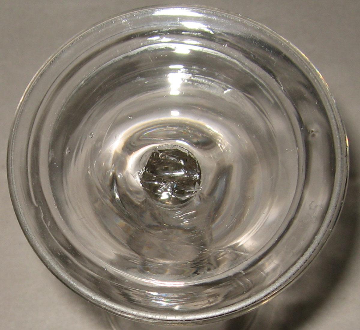 1958.0026 Glass wineglass (underside)