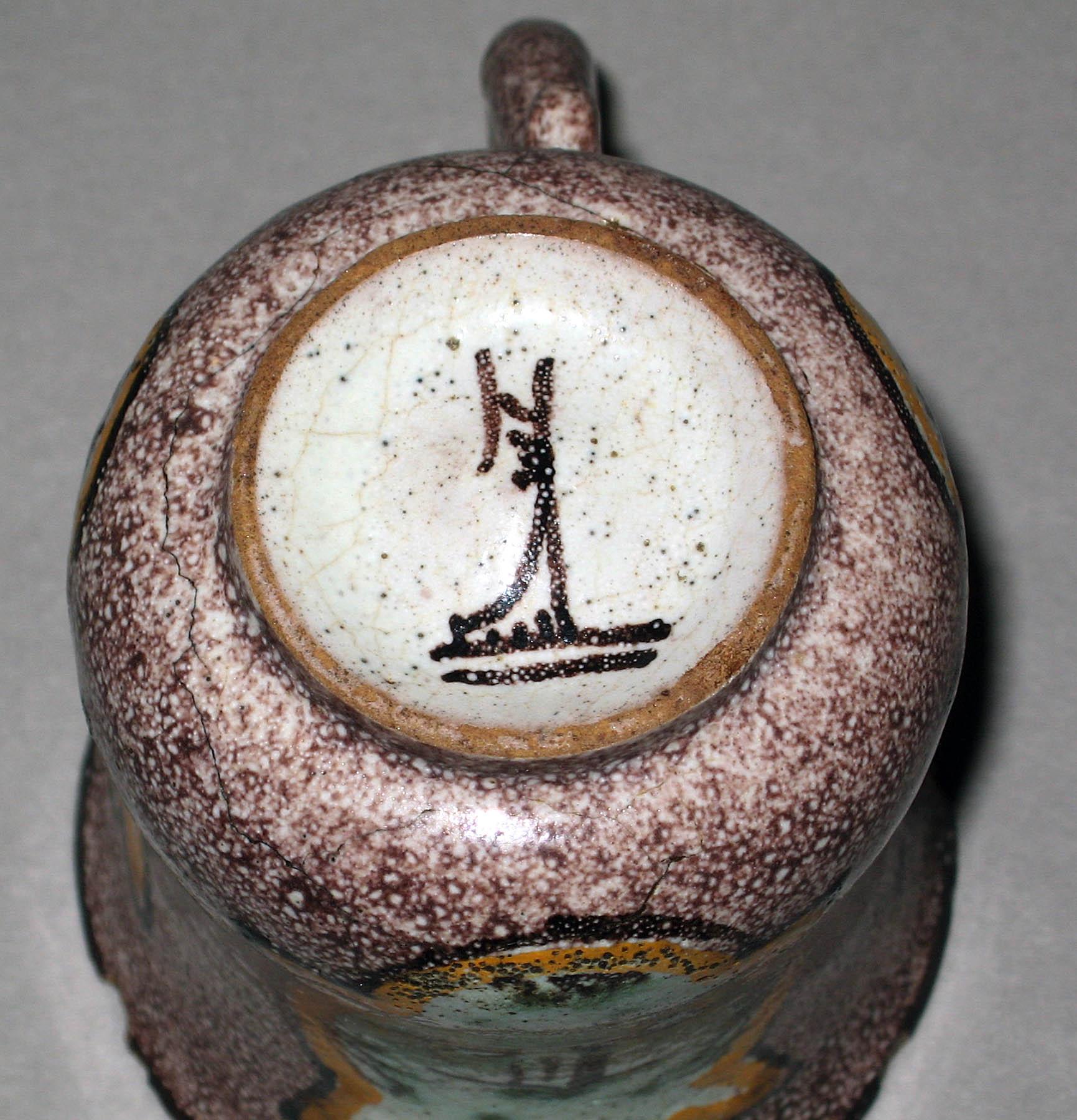 1958.0028.003 Earthenware cup (underside)