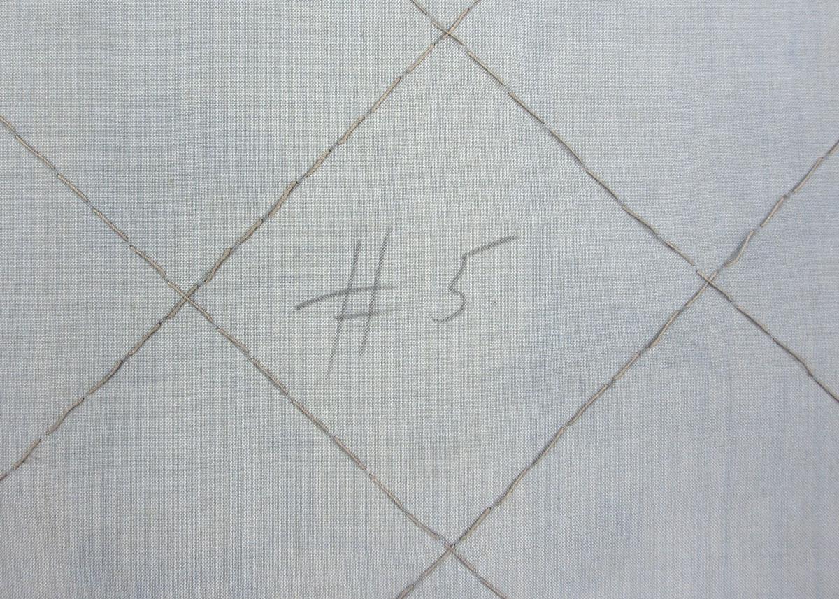 1984.0608.001 Slip cover inscription