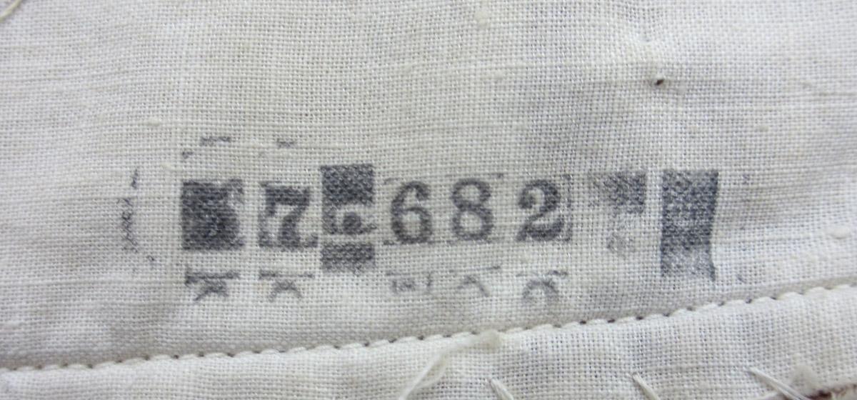 1984.0644.003 Slip cover inscription