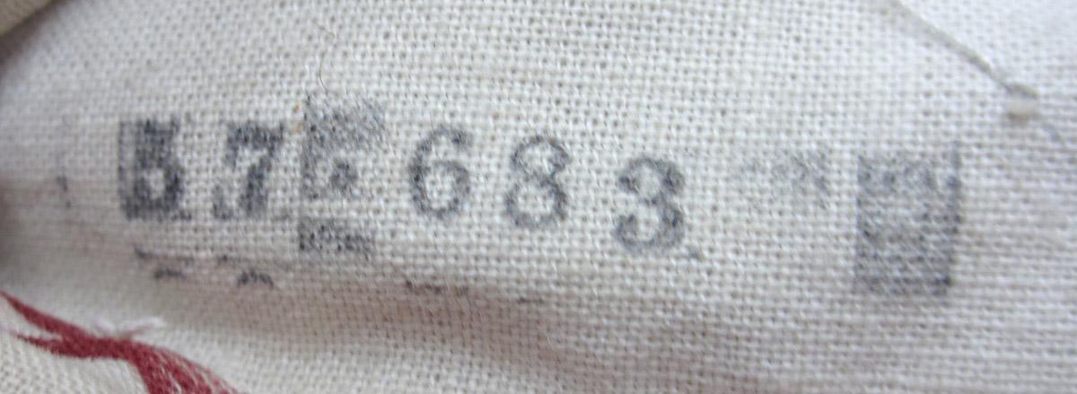 1984.0644.004 D Slip cover inscription