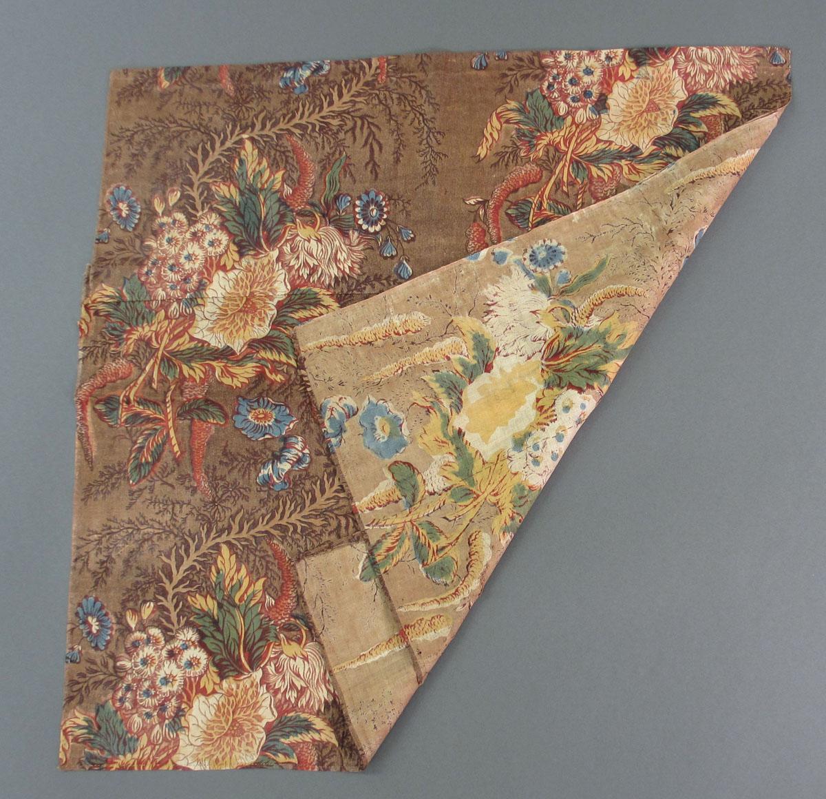 1958.0038.001 Textile, printed folded corner