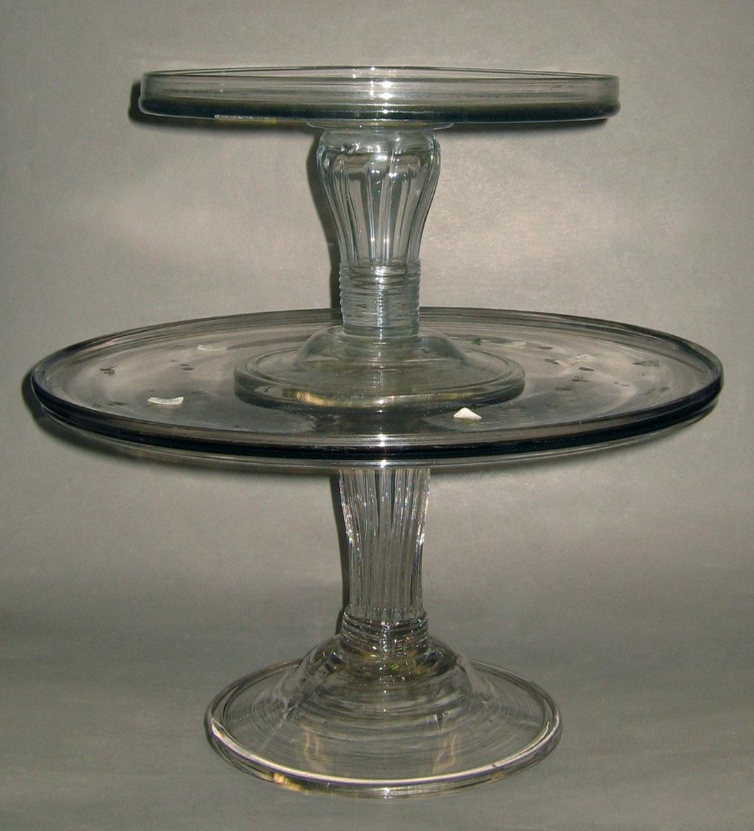 1985.0054 A, B Two colorless glass salvers