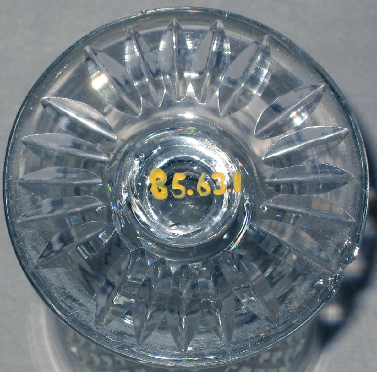 1985.0063.001 Colorless glass wineglass (underside)