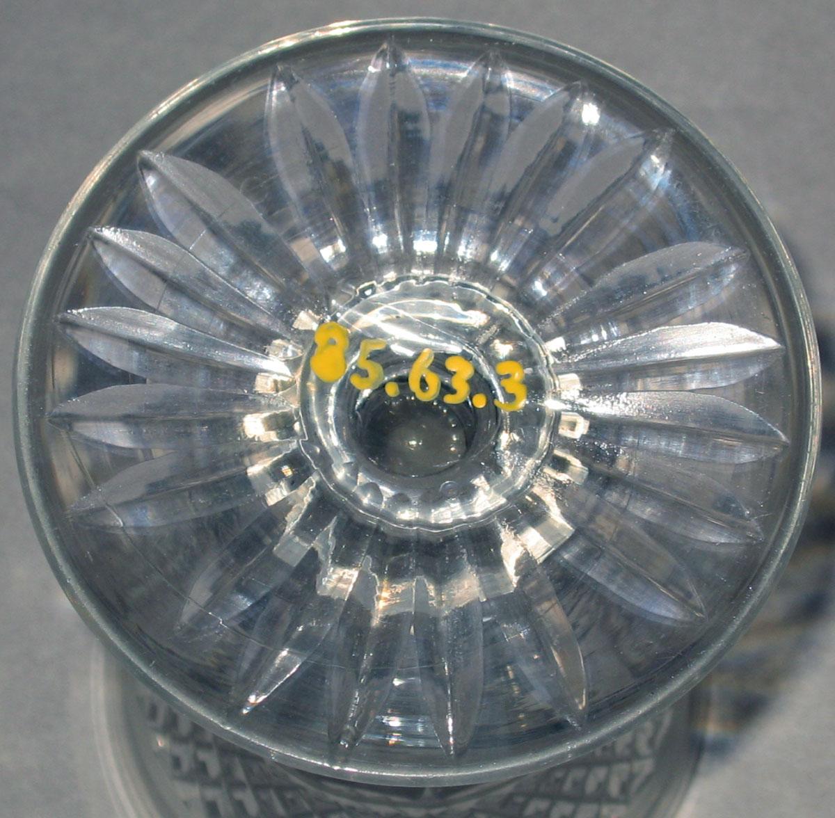 1985.0063.003 Colorless glass wineglass (underside)