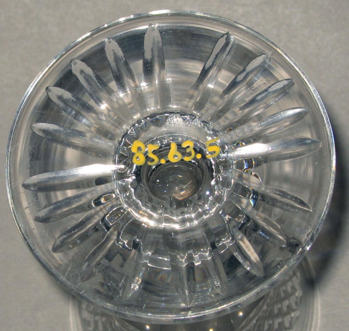 1985.0063.005 Colorless glass wineglass (underside)