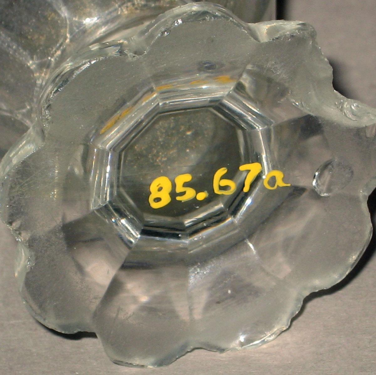 1985.0067 A Glass castor (underside)