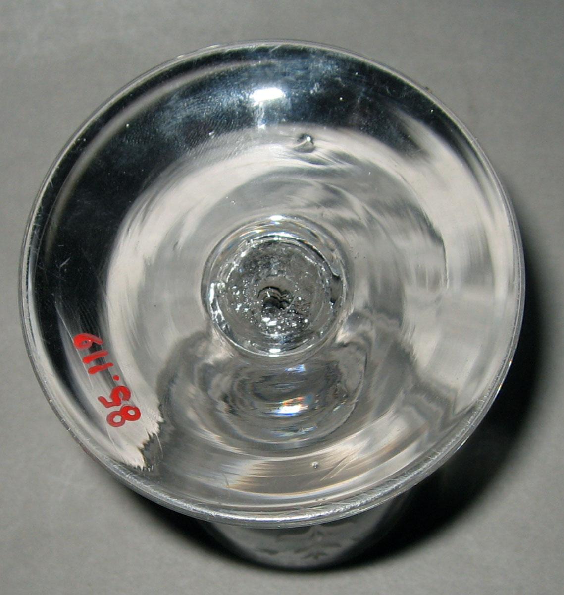 1985.0019 Colorless glass wine glass (underside)