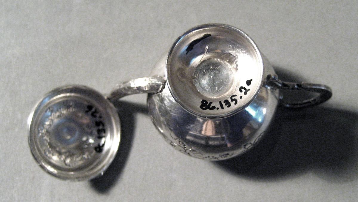 1986.0135.002 A, B Silver Teapot underside