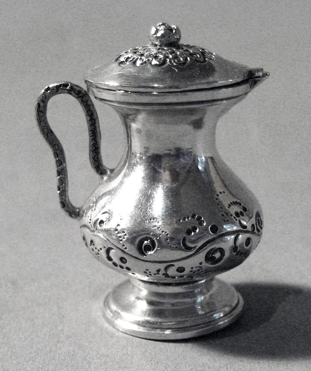 1986.0135.004 A, B Silver Cream Pot side 2