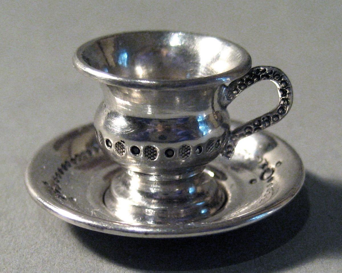 1986.0135.007 A, B Silver Teacup and Saucer