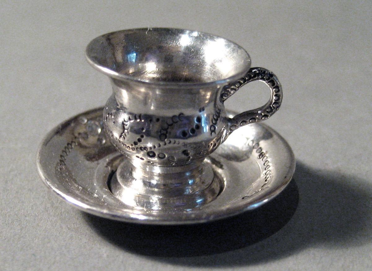 1986.0135.008 A, B Silver Teacup and Saucer