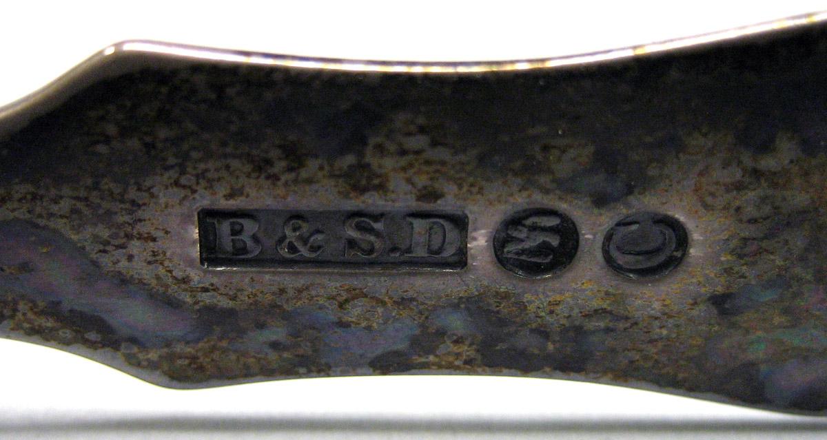 1987.0018 Silver Tongs mark