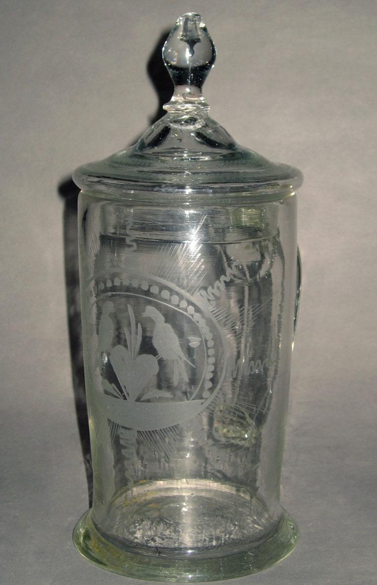 1987.0129 Colorless glass tankard