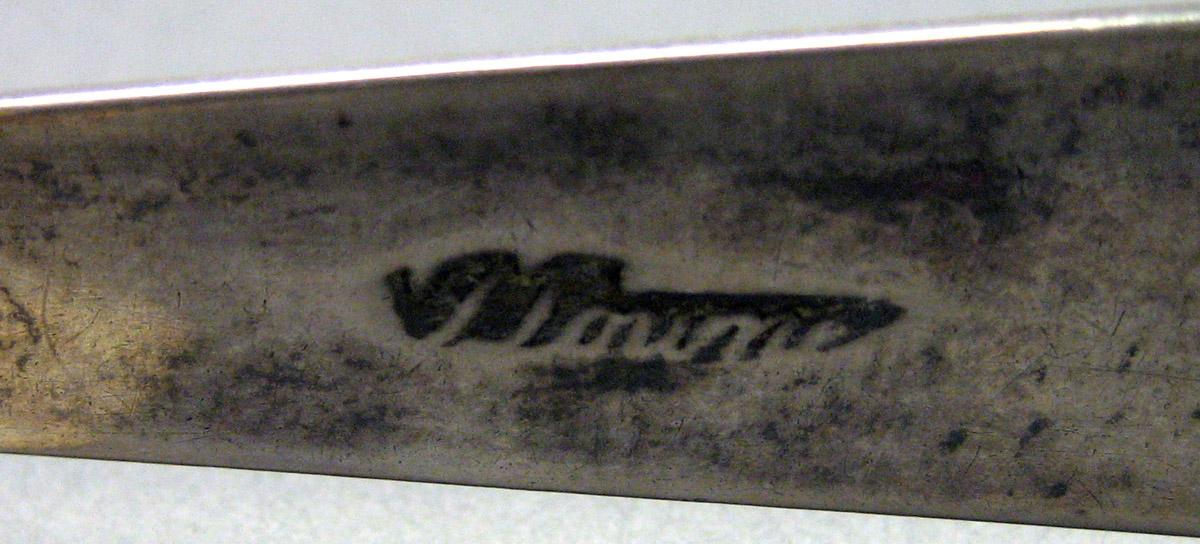 1989.0013.036 Silver Tongs mark 2