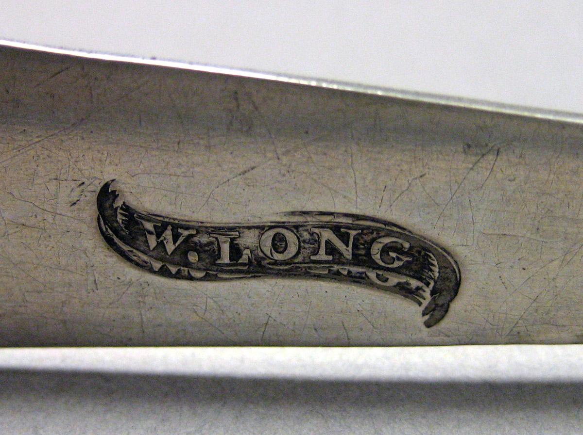 1989.0013.037 Silver Tongs mark 2