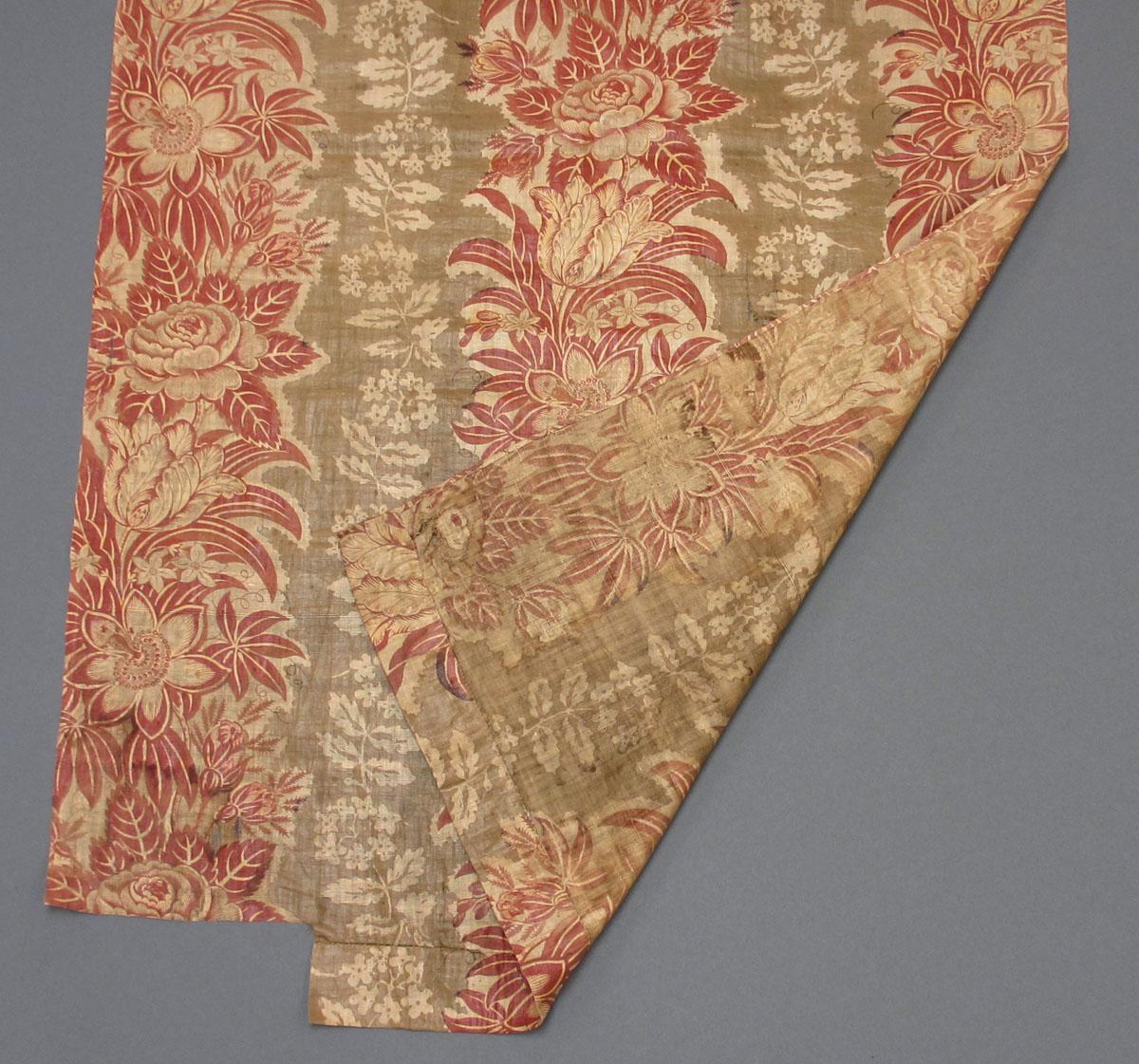 1958.0070.001 Textile, printed partial folded corner