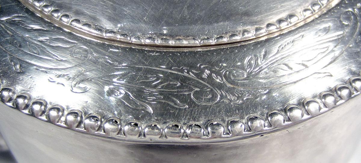 1990.0002.001 A, B Silver Teapot engraved decoration