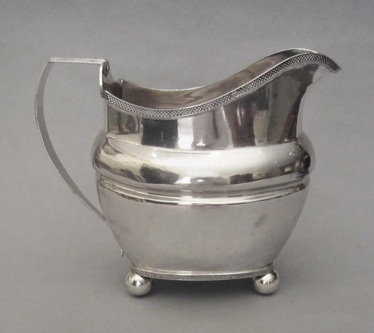 1990.0041.002 Cream pot, side 2