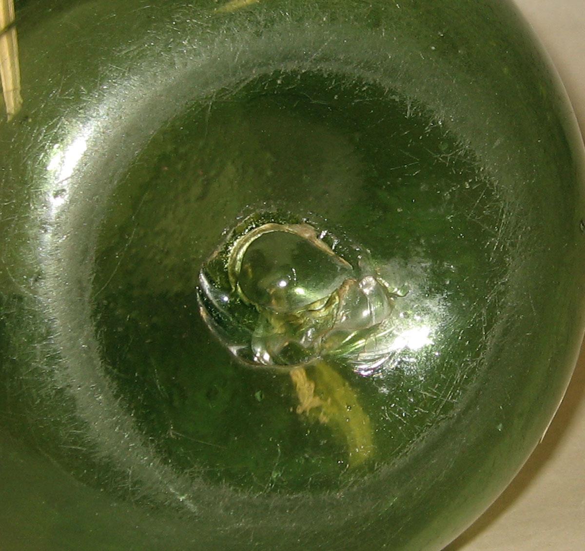 1991.0073 Glass jug (underside)