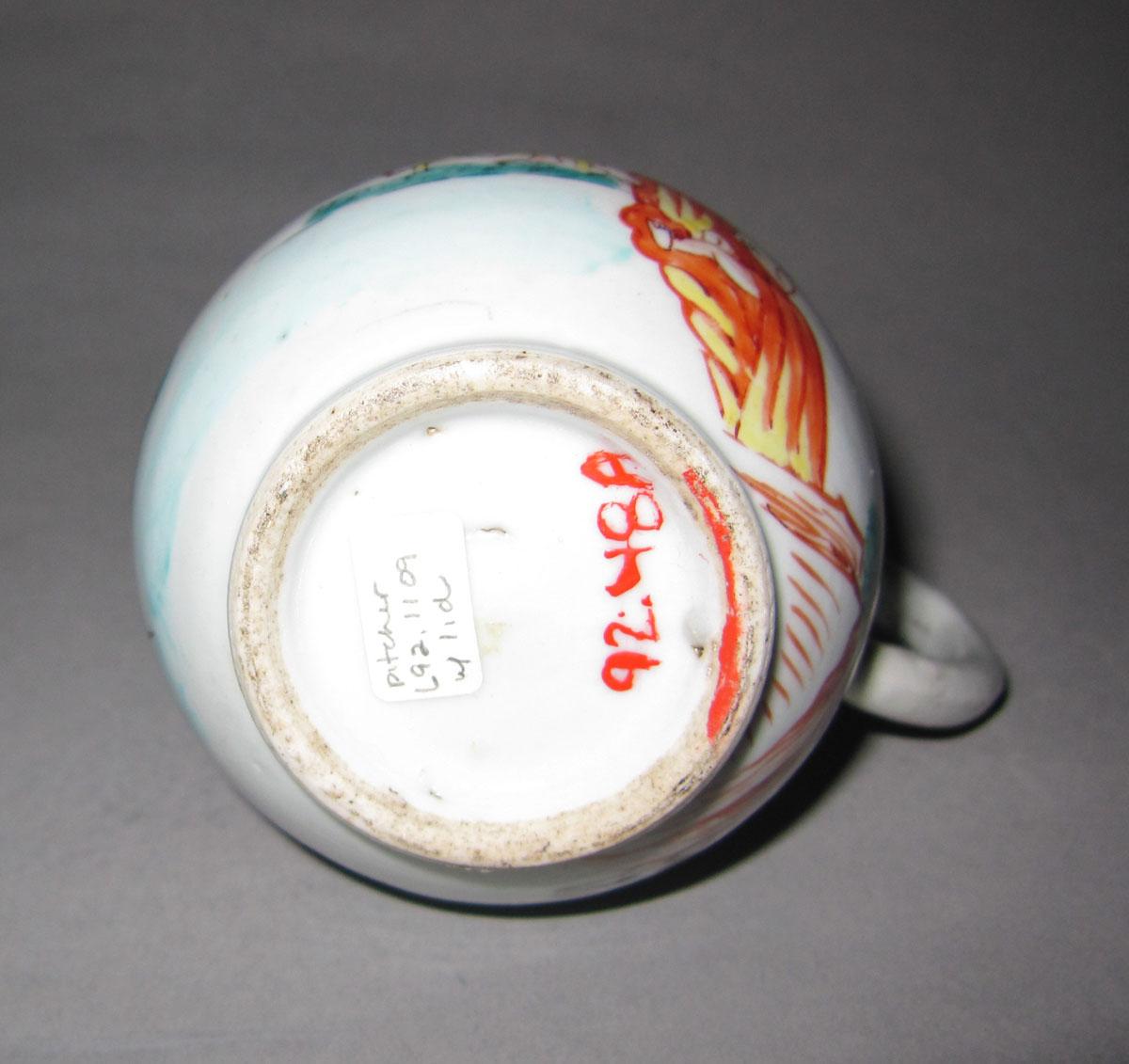 1992.0048 A Porcelain cream jug underside