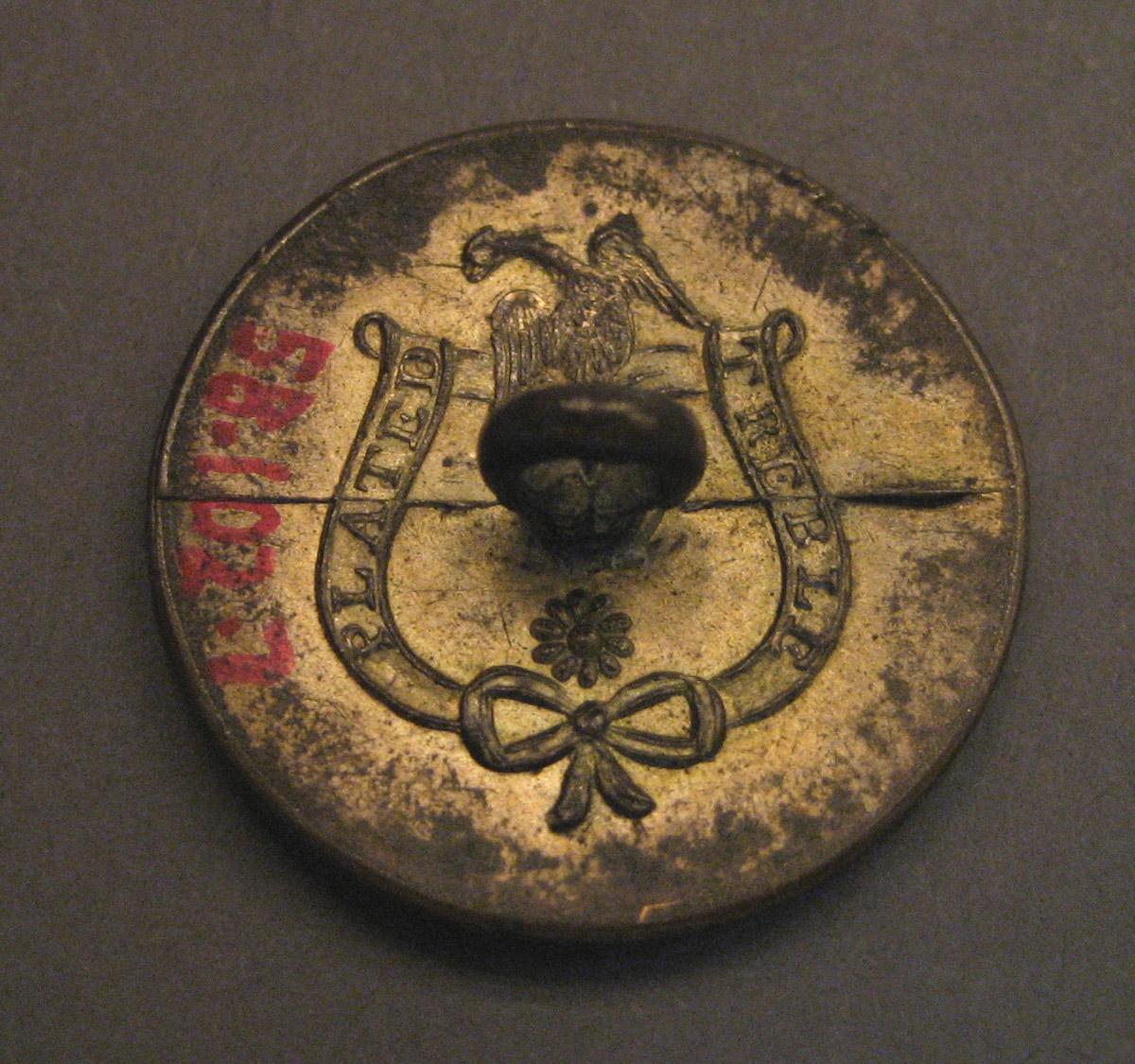 1958.0102.007 Button mark