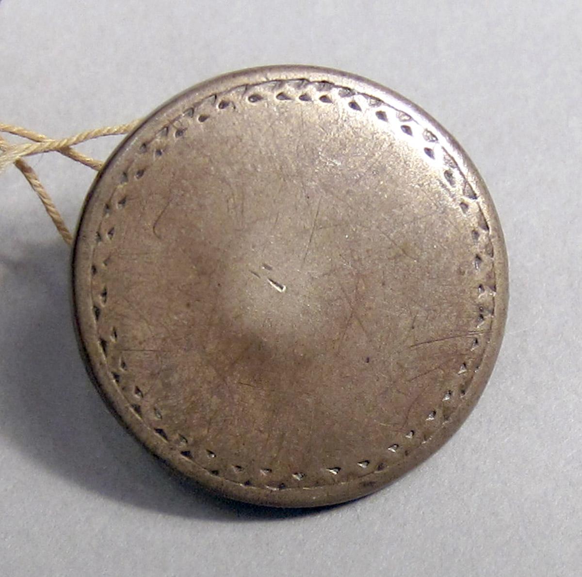1958.0102.009 Button upper surface