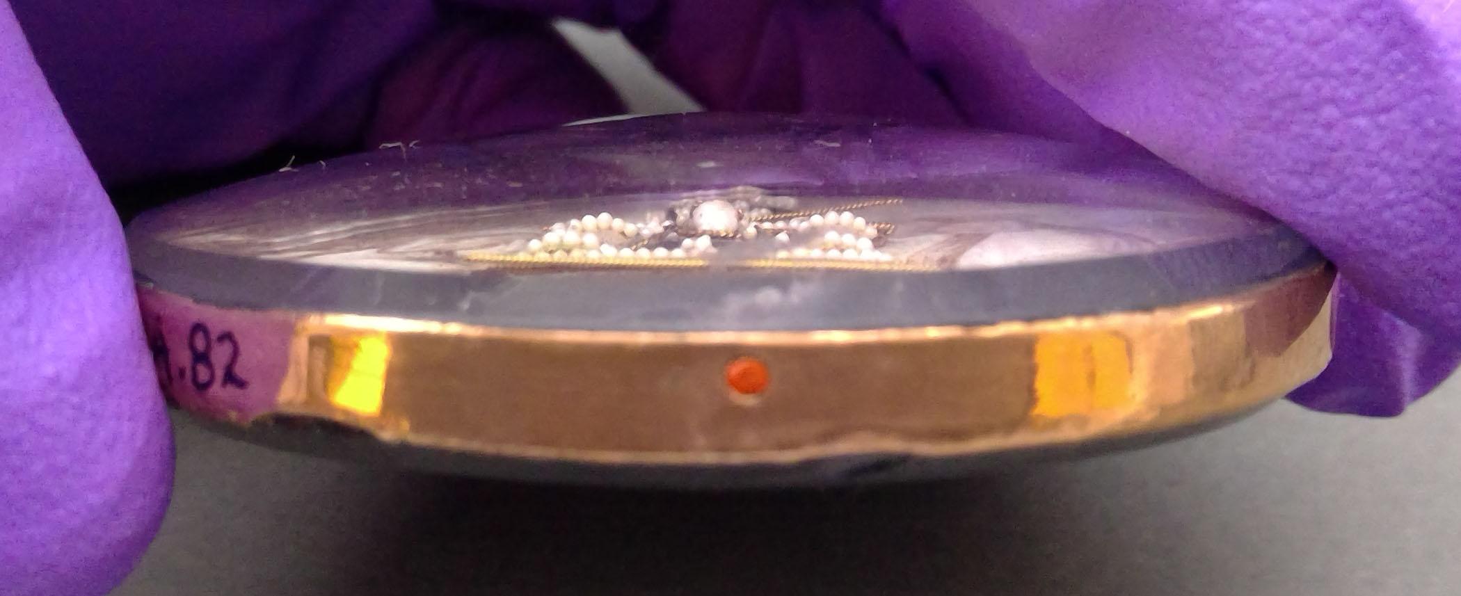 1994.0082 Pendant, Mourning brooch, detail
